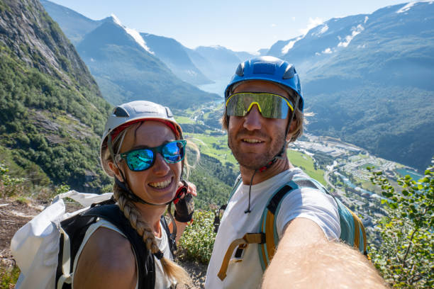 istock Couple Taking Selfie While Mountain Climbing in Norway 2150832477
