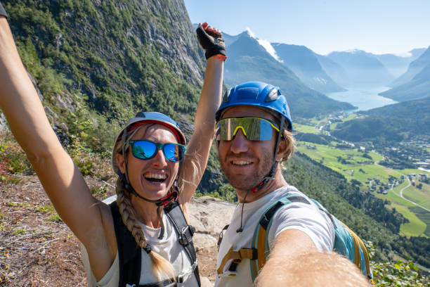 istock Energetic Couple Celebrating Hike in Norwegian Valley 2150832492