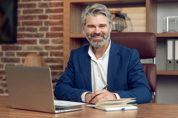 istock Man psychologist offering virtual consultations via laptop for remote assistance 2150833261