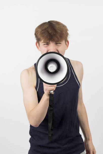 istock A teenage protester with a megaphone 2150835311