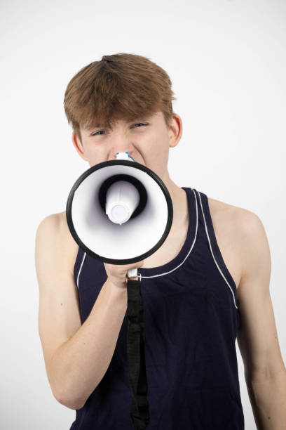 istock A teenage protester with a megaphone 2150835440