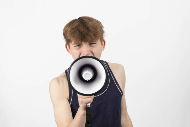 istock A teenage protester with a megaphone 2150835453