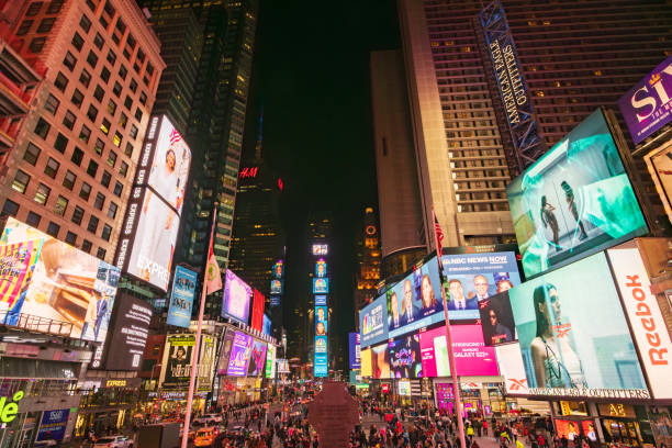 istock Times square at night in New York City (USA) 2150839558