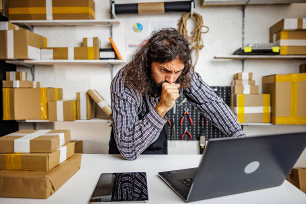istock Stressed man works in online store 2150839967