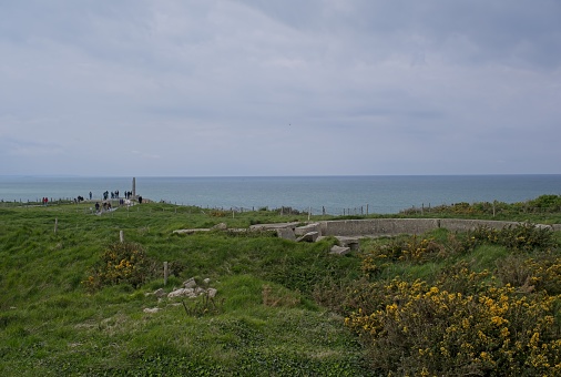 Cricqueville-en-Bessin, France - Apr 23, 2024: German Pointe du Hoc battery in Cricqueville-en-Bessin during Second World War. They fight against US Rangers. Sunny spring day. Selective focus