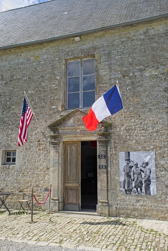 Sainte-Mere-Eglise, France - Apr 22, 2024: In this castle Collins, Eisenhower and Bradley met to discuss the Cobra operation in the Cotentin during second world war. Sunny spring day. Selective focus.