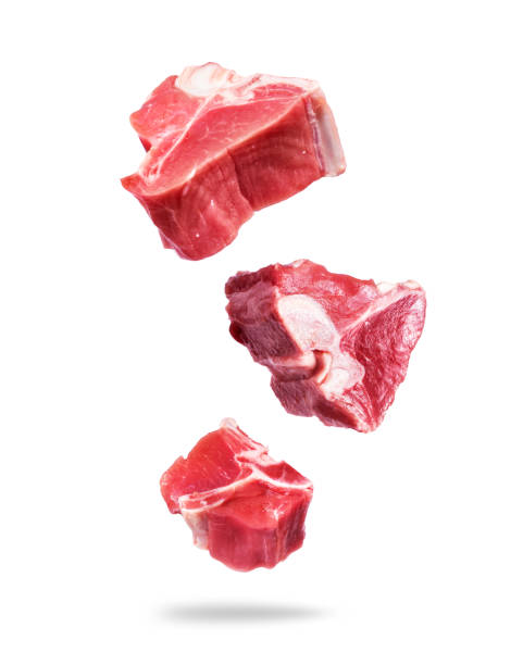 istock Raw beef meat steaks in the air on a white background 2150841159