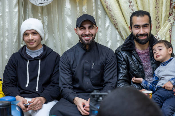 A group of Arab people is dancing and celebrating various occasions such as weddings, graduations, Eid, newborn arrivals, and having a wonderful time