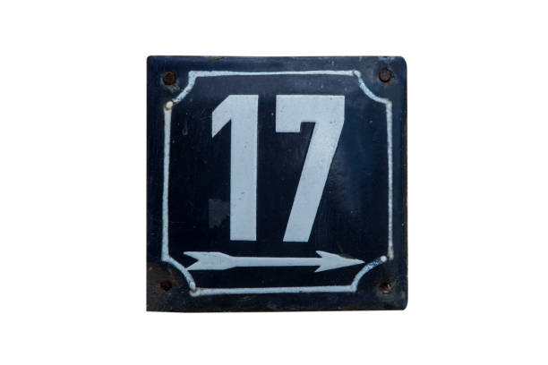 istock Weathered metal plate of number 17 2150846141