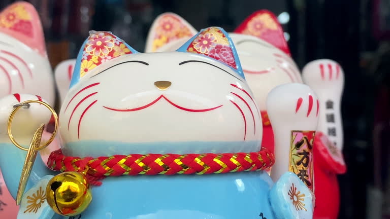 Chinese lucky cats in store window