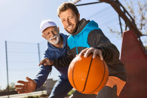istock Father and Son Basketball Bonding 2150852265