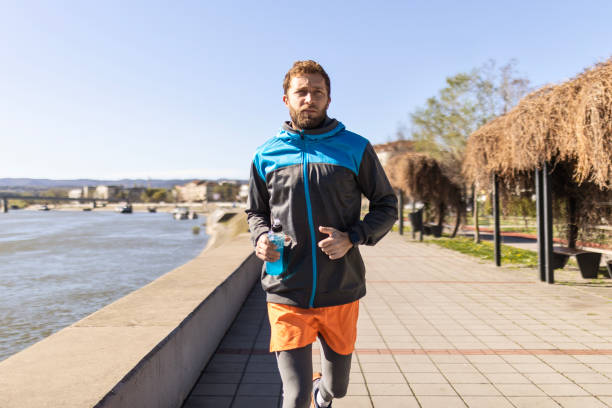istock Athlete Jogging Near the River 2150852292