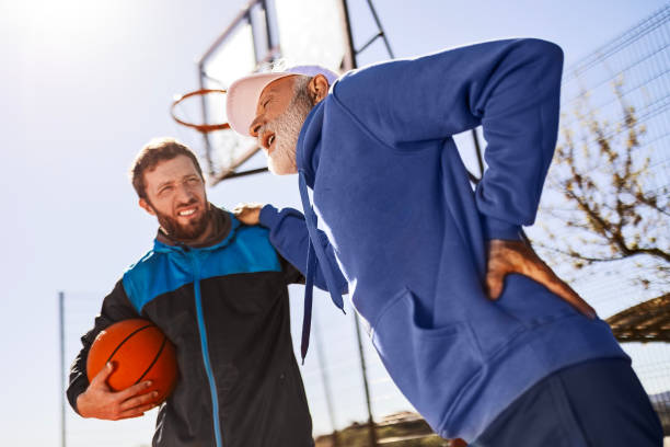 istock Father and Son Basketball Timeout Because of Backache 2150852296