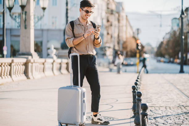 istock Tourist hailing a taxi 2150855424