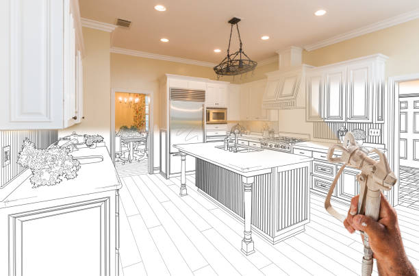 istock Professional Spray Painter Holding Spray Gun Spraying Renovated Kitchen Over Design Drawing. 2150856003