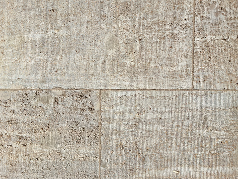 Close-up of a wall clad in limestone