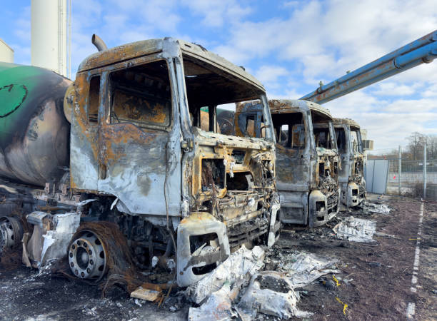 Destroying vehicles of a concrete manufacturer protesting against the high co2 emissions of the construction industry