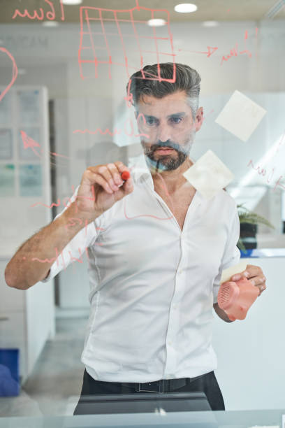 istock Serious man creating new sample of covid mask 2150860362