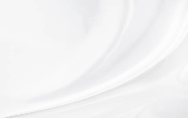 istock White gray satin texture that is white silver fabric silk background with beautiful soft blur pattern natural. 2150861589