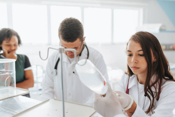 istock Nurse preparing serum in hospital 2150864078