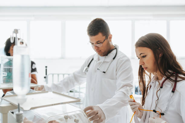 istock Medical professionals working in incubator 2150864112