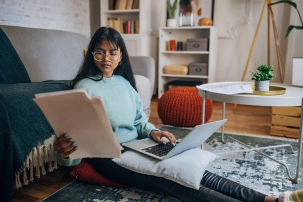 istock Woman working on laptop at home 2150866309