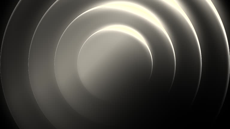 An abstract show of elegant circle concentric shapes glowing and pulsating