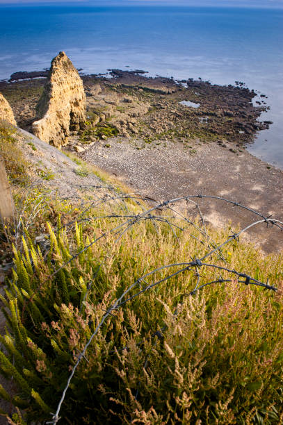 istock The rocky promontory, Pointe du Hoc. 2150875631