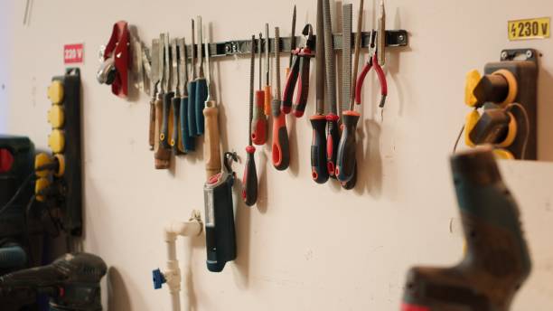 istock Close up of electric router with woodworking tools on rack 2150881580