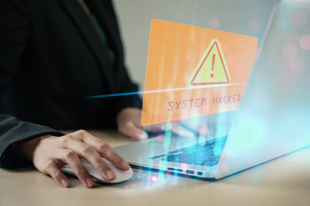 istock Mature Businessman looking at an internet failure screen on a computer. 2150883342