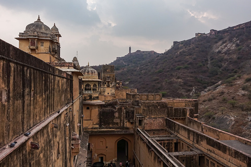 The Amber Fort domes next to Jaigarh Fort situated on the promontory called the Cheel ka Teela (Hill of Eagles) of the Aravalli range