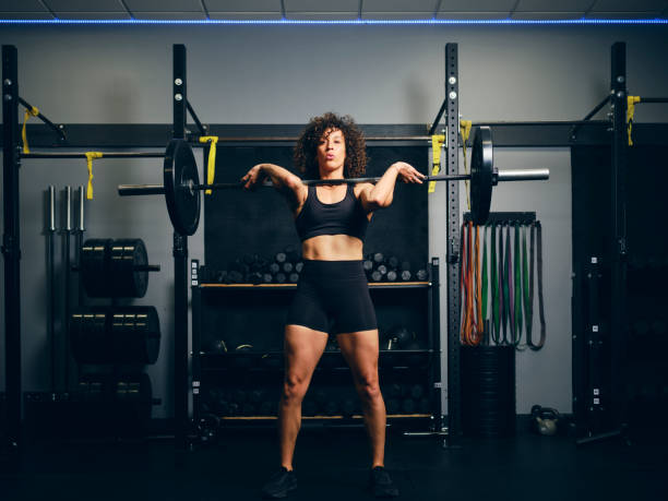 istock Woman Weight Training in a Gym 2150885901