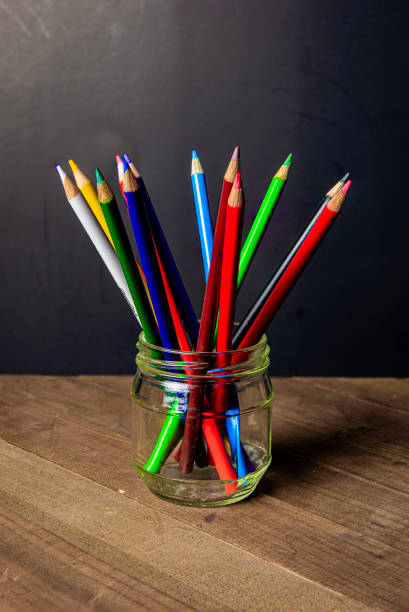 istock Colored pencils in a glass jar 2150887889