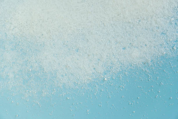 istock sea salt on blue background top view 2150889913