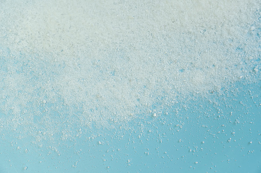 sea salt on a blue background top view