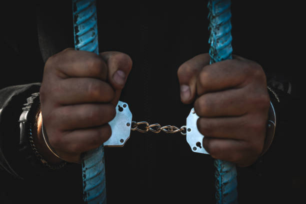 7,300+ Black Handcuffs Stock Photos, Pictures & Royalty-Free Images - iStock | Police black handcuffs