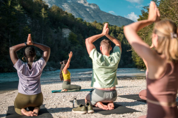 istock Diverse Group led by Indian Female Yoga Instructor 2150891772