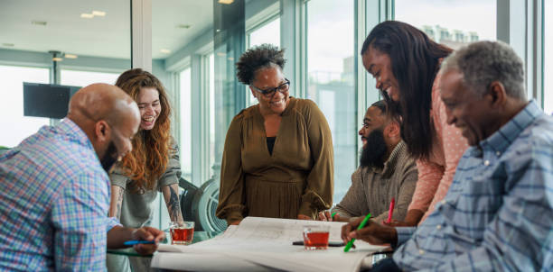 istock Creative businesspeople having meeting in modern office. 2150891991