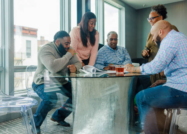 istock Creative businesspeople having meeting in modern office. 2150891994