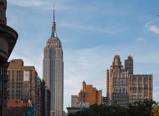 The iconic Empire State Building skyscraper as seen from Union Square in Manhattan, New York City