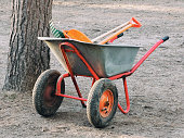 Two wheeled cart with garden equipment