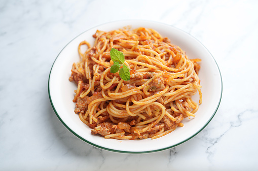 Spaghetti with tomato and pork meat