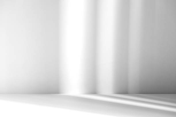 istock Wall interior background, studio and backdrops show products.with shadow from window color white . background for text insertion and presentation product 2150911098