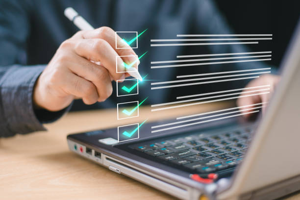 istock Review online approval, digital research. Document audit inspection, business asset analysis concept. Man inspects data, file check checklist online survey. Efficient document form project management 2150913527