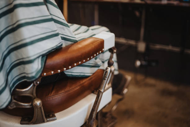 istock Unrecognizable man sits in a trendy salon chair 2150914315