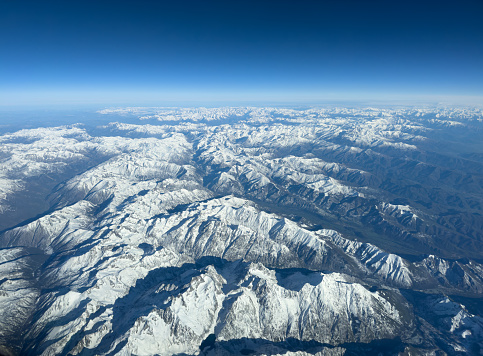 Aerial view of European Alps in spring. Snow still present on the Glaciers