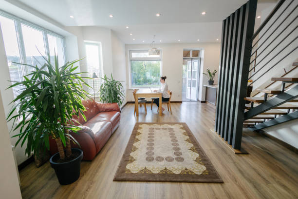 istock Woman working in modern private home interior 2150917021