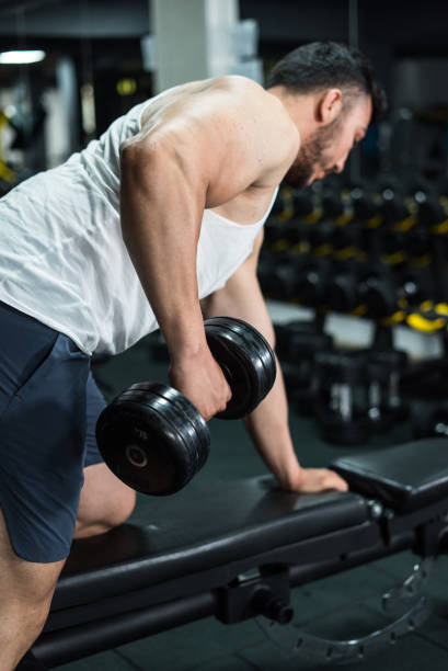istock body builder is doing exercise at gym vertical sport still 2150918150