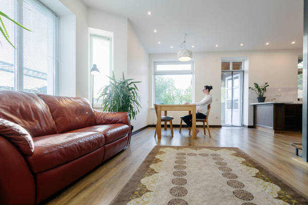 istock Woman working in modern private home interior 2150918225