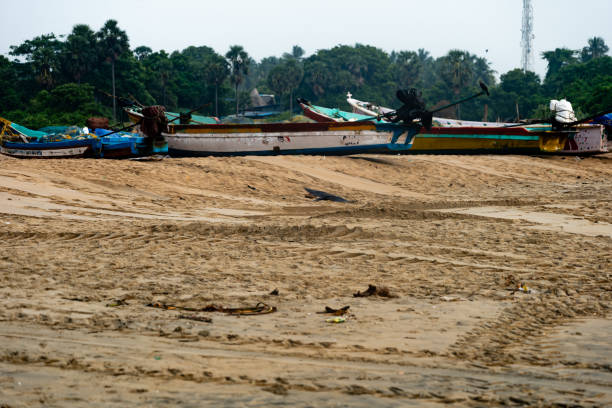 istock Serene Fishing Boat Resting on Sandy Beach 2150918375